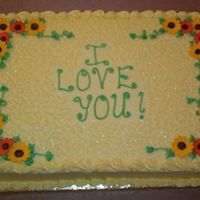 Reunion Cake This is a half-sheet dark chocolate fudge cake with cream cheese icing. All she specified was the "I love you!" and pretty...I...