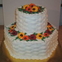Daisies And Black-Eyed Susans I made this two-tier white lemon cake with raspberry filling for my husband's cousin who was hosting a bridal shower. She specified...