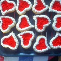 Valentines_Cookies.jpg These are some valentine's cookies I made week before last, decorated them with buttercream frosting