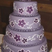 2007 Fair Entry This cake was my nightmare cake - had to redo it 3 times!! Its 12 10 8 & 6 inch rounds, covered in fondant. Airbrushed a dark purple...