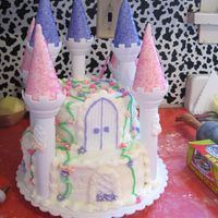 My First Castle Cake :d bottom: 2-9" vanilla rounds torted filled with (top to bottom) Strawberry buttercream, vanilla cream, Strawberry preservesTop 2-5&quot...