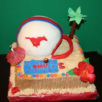 Smu Football Season Kickoff Luau butter creme with fondant and gumpaste decorations helmet covered in fondant Thanks to sugar fancy and cakesby allison for ideas and...