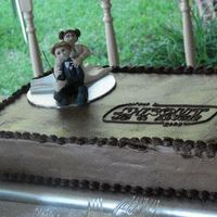 Star Wars Homage Chocolate sour cream cake with toblerone filling and chocolate marble frosting. Their names and the wedding date was written in a Star Wars...