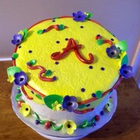 Angie's Garden Birthday Cake Buttercream cake with fondant accents single layer topsy turvy style.