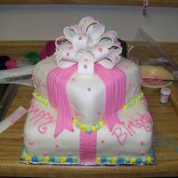 Birthday Cake I made this b day cake for my boss.. It is two 12 in square strawberry cakes on bottom with a strawberry dream filling inside, the top tier...