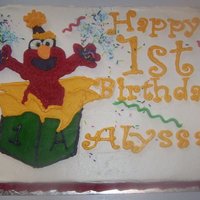 Elmo Cake Made for friends' daughter's first birthday. Also included (as seen in second photo) a small elmo in a car cake for grandpa that...