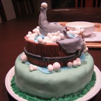 Dumbo In Bath Chocolate mudcake with Dumbo made from modelling paste. All else made from sugarpaste. This cake was for my father who loves Dumbo!