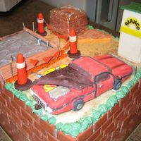 Construction Site Cake - My husband is a builder so I thought this cake would suit him best. The Happy Birthday message was etched into the concrete slab. The bulk...