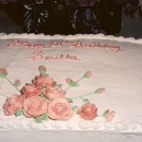 60Th Birthday Cake This is a birthday cake I did with peach buttercream roses for a family friend.