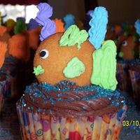 Fish Cupcakes Vanilla cupcakes with chocolate ganache icing. Fish made out of Nilla wafer cookies and royal icing.