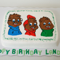 Chipmunks Birthday Cake 9"x13" yellow cake covered in buttercream. Fondant letters. Made for a 3 year old's birthday.