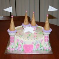 Castle I got this idea off of the CM site. The cake is decorated in BC with fondant accents. Turretts are icecream cones covered in fondant and...