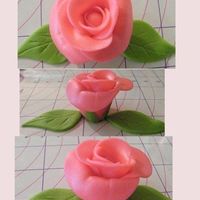 My First Fondant Rose My very first attempt at creating a rose from fondant. I was playing with the left overs from my easter cupcakes.