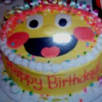 Happy Smiles! This is a party smile. This cake was made for a co-worker. It is a good cake for a general birthday theme.