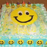 Tye Dyed Smiley Face This was a special request for a tye dyed smiley face cake. My niece loved it and the cute candles that I found to match it! This is my...