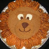 Lion Cake I made this cake for a 4th birthday party, and it was a huge hit! I used a 10 inch round cake pan for the face, and then baked about 3/4 C...