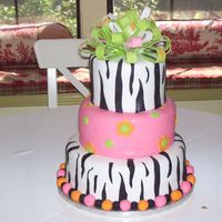 Harpers 1St Birthday 6,8,10" all fondant the bottom layer is covered in ganache before the fondant went on. There are little 1's on the bow to make it...