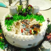 Shrek Cake This cake was for a friends little boy that just loves this movie its a coconut cake filled with coconut cream shredded coconut and pecan...