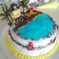 Spongebob I was asked by a co-worker if i could bake a cake for her son, that he loved spongebob, so here it is a pirate scene, everyone loved it...