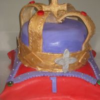 King Henry's 1St Birthday Cake chocolate choc.chip cake (pillow), white cake with raspberry and cream cheese filling in crown. Gumpaste and fondant. Thank you for the...