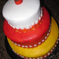 Candycorn All three tiers French vanilla cake with chocolate buttercream filling, buttercream icing spray painted (first time with a real gun). Sold...