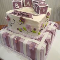 Plum Baby Shower This was done to match the nursery bedding - Disney Coco Plum Butterflies. All butter cream with fondant stripes/flowers/butterflies. 12...