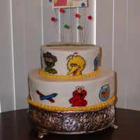 Sesame Street This cake was for my Nephew's 2nd Birthday. He loves E L M O and his friends. He saw the cake and named every character. 8" &amp...