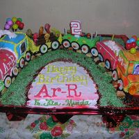 Choo Choo Train I prepared this for my 2 year old nephew..all are edible except for the canldles & balloons..made of butter and chocolate cakes with...