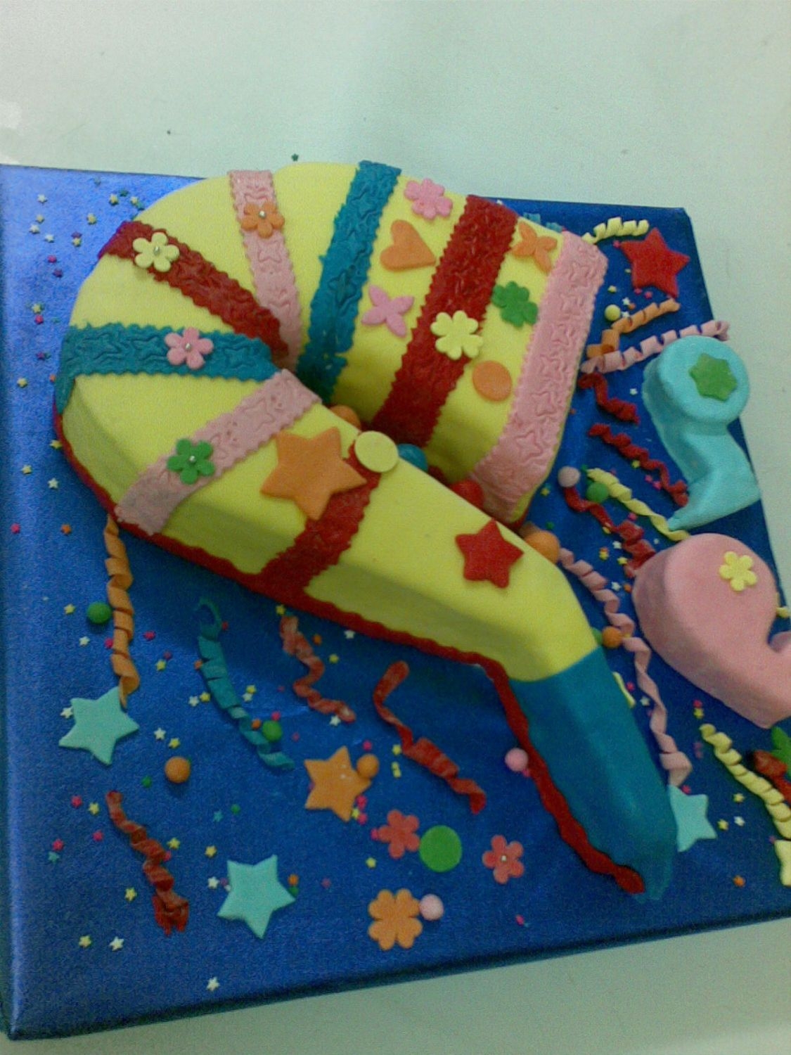 Trumpet Cake This is best for new year but can be used as celebration cake... I learned only making fondant last month (March 2008).. hope it will...