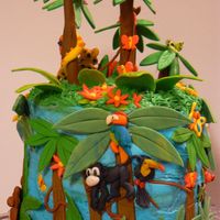 Rainforest Birthday Cake Red Velvet Cake, Cream Cheese Icing, Gum Paste Decorations