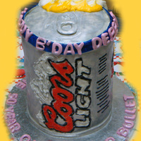 "the 50 Yr Old Silver Bullet" My friend asked me to make this cake for her mom who was turning 50 and loves Coors Light Beer...lol. Thx for looking! :oD