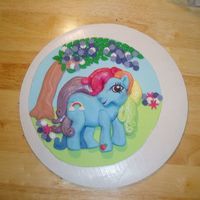 My Little Pony This was copied from a party plate. It was placed on a round cake after it dried.