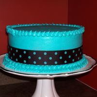 Southern Living Party Cake aqua buttercream with brown pokadot ribbon