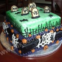 Graveyard Cake I made this cake at the last minute really...I just wanted something cute to bring into work. It's square pumpkin cakes with pumpkin...