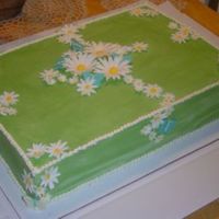 Picnic Daisies This was a labor day picnic cake. White and red velvet layers with almond BC filling and BC icing. Gumpaste diasies, and white chocolate...