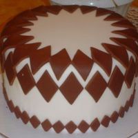 Resized_Diamonds.jpg Wanted to try Toba's fondant so I made this cake. I really liked the texture and working with this recipe was great but I still prefer...