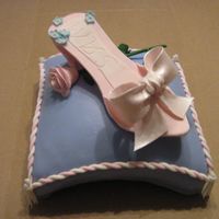 Img_0968.jpg My first gumpaste slipper. It cracked a little on the heel. But like by best friend always tells me "that's something only you...