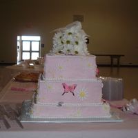 Pink Square Daisy Butterfly Cake This is a square three tier cake. I had a problem with icing this cake, so please forgive any mistakes. Our air condition went out while I...