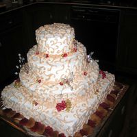 My Wedding Cake This was my wedding cake. There is actually a real rose bouquet that went on the top tier but I don't have those pictures back yet....