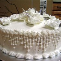 Anniversary Cake This cake was for a friends parents anniversary. They wanted something that looked like a wedding cake only not so big. The roses on top...