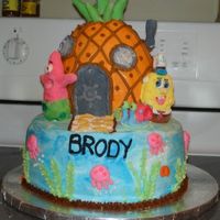 Spongebob Birthday I made this for my son's 7th birthday. All the details are fondant and the rest is butter cream. Pineapple is yellow cake and the...