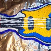 Guitar Cake I made this cake a few yrs ago for my son. I had no idea how to decorate a cake like this but it came out pretty well for not knowing what...