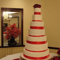 7 Tier Anniversary Cake Covered with fondant,Free hand piping.16",14",12",10",8" ROUNDS,6"Hexagon and 4" round. Vanilla cake...