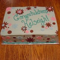 8Th Grade Graduation Lemon poppy seed cake with lemon BC frosting, fondant accents