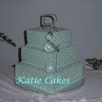 Blue Squares With Stars I had a hard time making this cake because I just don't like this color and then having to hand pipe a bazillion little stars on it....