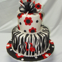 Sweet 16 I borrowed this design from CareyI on CC. Please excuse the plastic holding the bow to dry and the two pins in the "16" also...