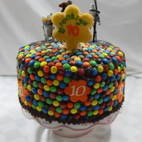 M&m Cake I wanted to use a great tasting chocolate icing as my grandaughter loves chocolate. Well, turns out its pretty soft, but I wasn't...