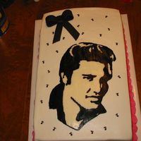 Elvis Cake This is a work in progress. It has stars and a banner to go on. The stars are on wires and the banner goes across the bottom of elvis. I...