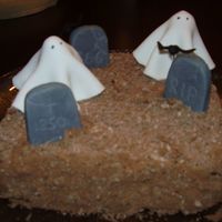 Graveyard Cake Quick and simple cake that didn't turn out as well as i had hoped.The ground is a crushed chocolate Flake