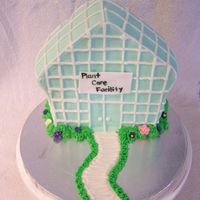 Greenhouse Cake A cake I made yesterday for a cookout at the greenhouse I work at. I used the stand up house pan.